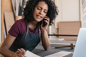 business owner talking on the phone