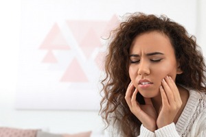 Woman with tooth pain