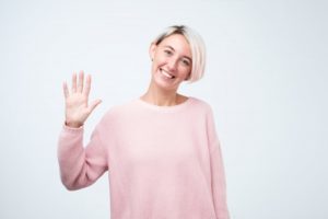 Woman waves at her Castle Shannon dentist in COVID-19